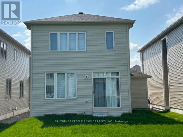 Photo du bâtiment - 419 Black Cherry Cres
