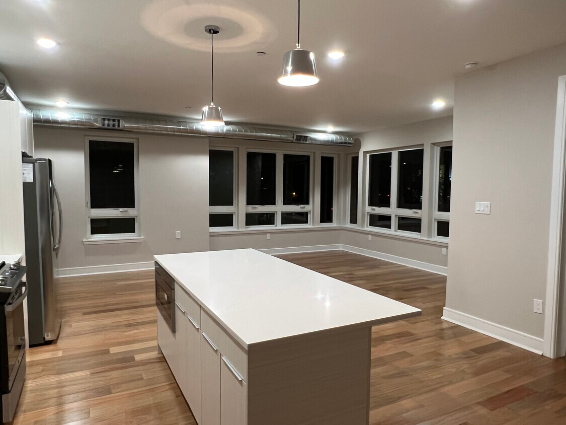 Large corner windows in the Living area allow for natural light - 3202 Capri Dr