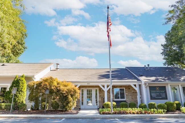 Clubhouse Exterior at Woodbridge of Bloomington Apartments - Woodbridge of Bloomington