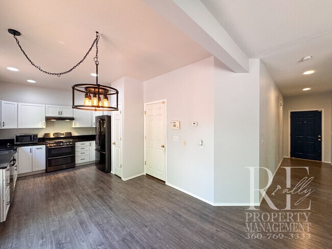 Building Photo - Dual Primary Suites, Huge Backyard Deck & Sun-Filled Living Spaces Near Everyday Conveniences