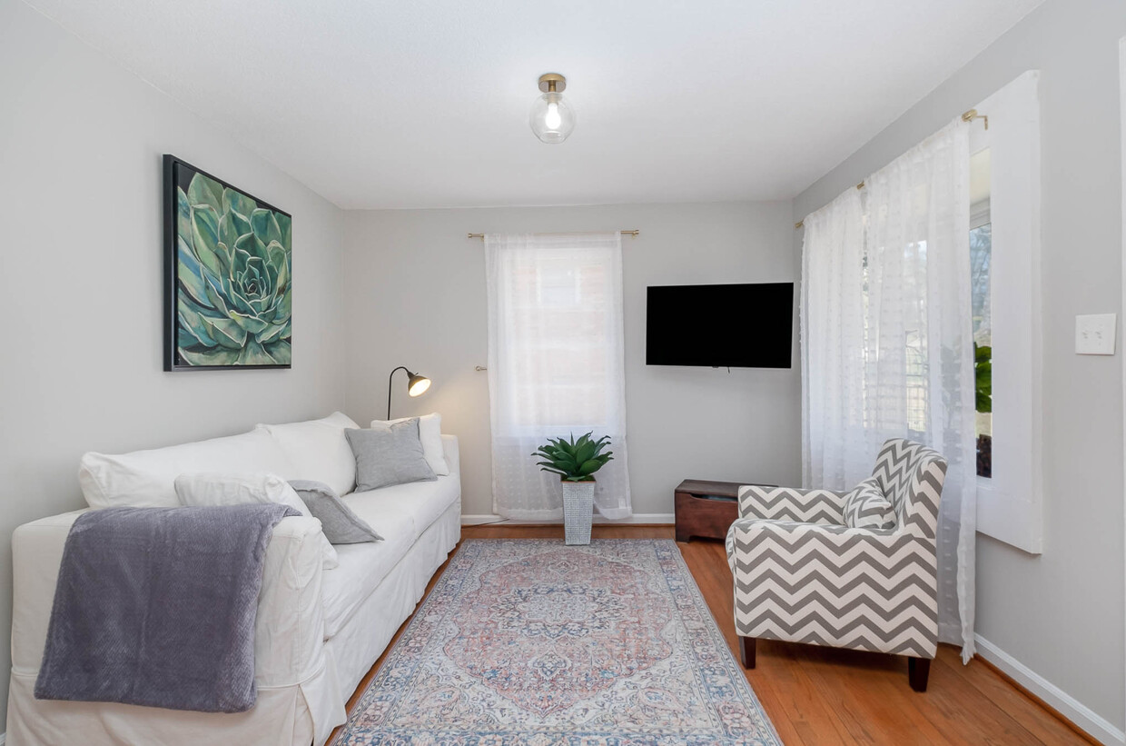 Living Room with Crate and Barrel super comfy sleeper sofa - 123 Archdale Dr