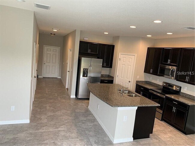 Foto del edificio - 7042 Grand Elm Dr