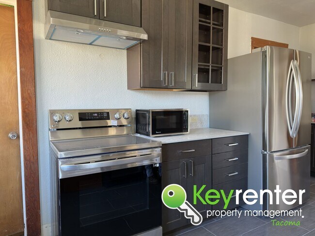 Foto del edificio - Early Classic 5Bed/3Bath Tacoma Home