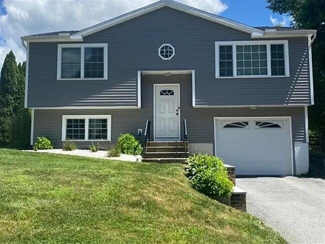 Building Photo - This newly renovated single family home