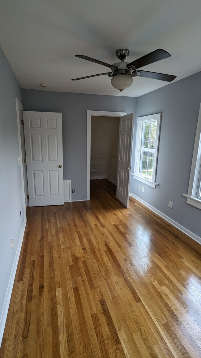 bedroom with walk in closet - 1 West St