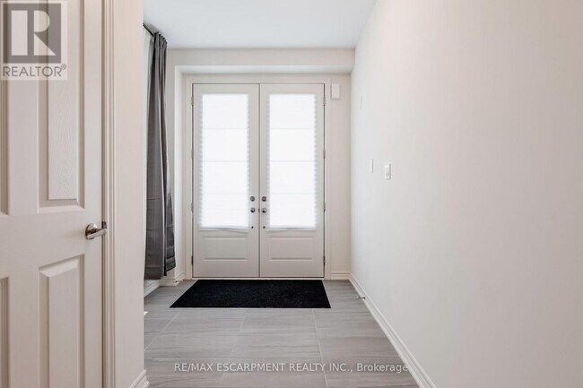 Photo du bâtiment - 48 Sparrow Wy