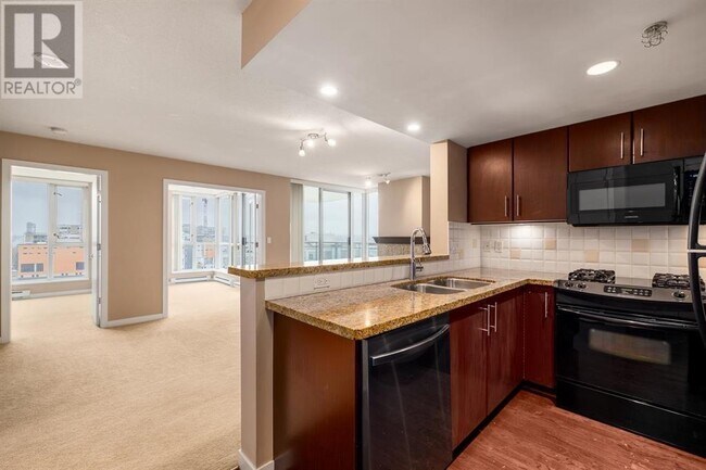 Photo du bâtiment - 120-1120 Milross Ave
