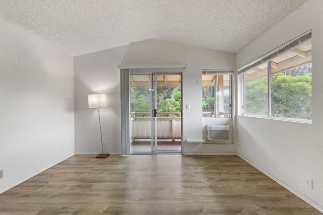 Building Photo - Luxury Living: 2-Bed Condo with 2 Parking Spots & Full Amenities!