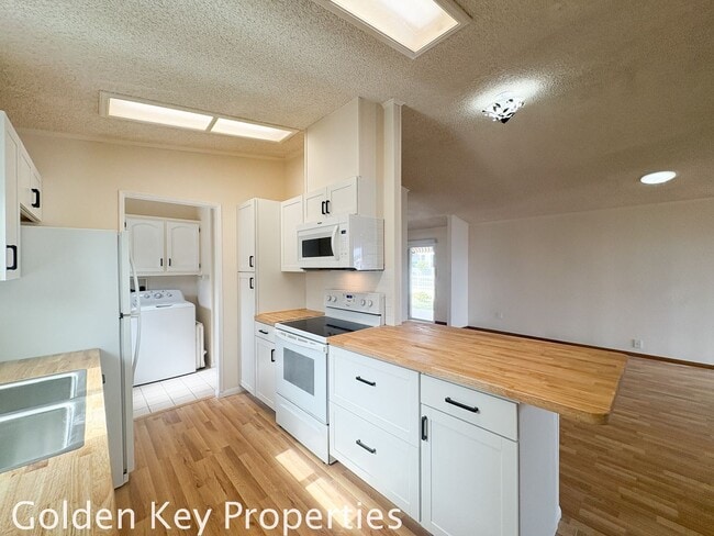 Building Photo - Welcome to the spacious single-level manuf...