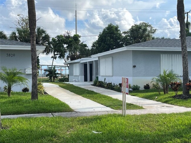 Building Photo - 5820 NW 27th Ct