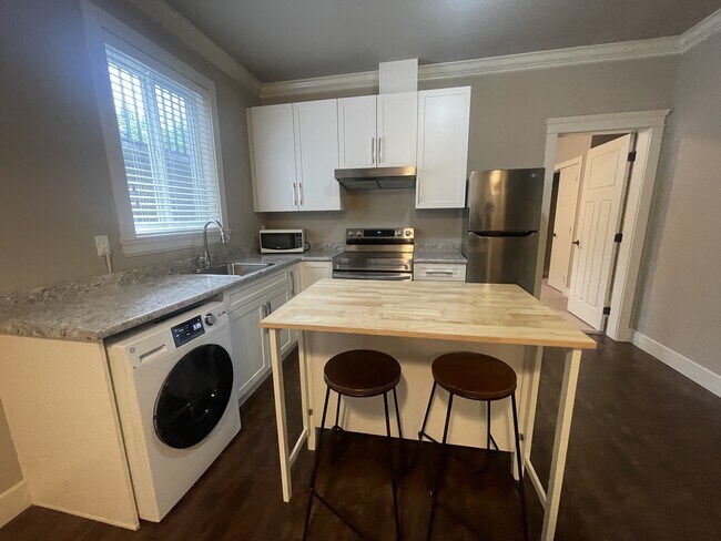 Photo du bâtiment - 16323-1626A 26a Ave