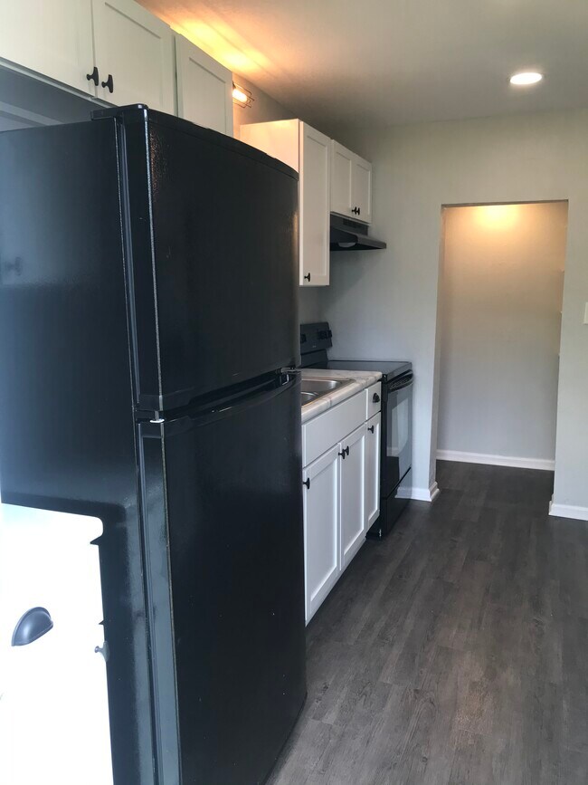 Brand new black refrigerator - 932 E Sycamore St