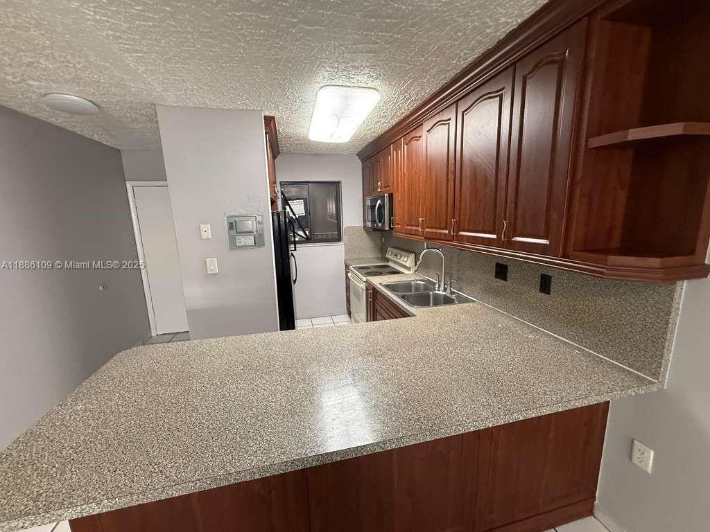 Foto principal - 6055 W 19th Ave
