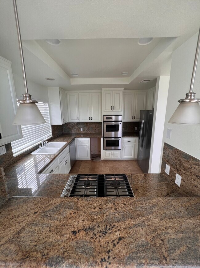 Bright Kitchen with Stainless appliances - 415 Narcissus Ave