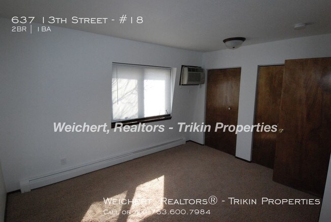 Building Photo - 637 13th St S