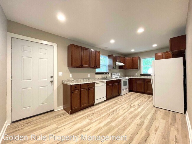 Foto del edificio - 3 br, 1 bath House - 404 E 7th Ave