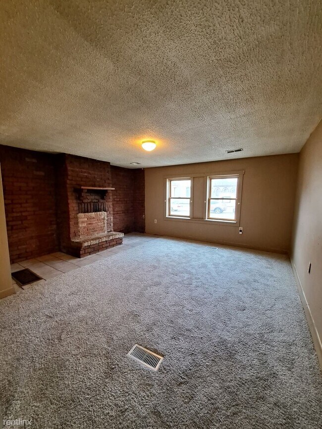 Building Photo - 3 br, 1.5 bath House - 305 S Downing St