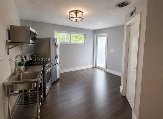 Building Photo - 586 NW 48th St