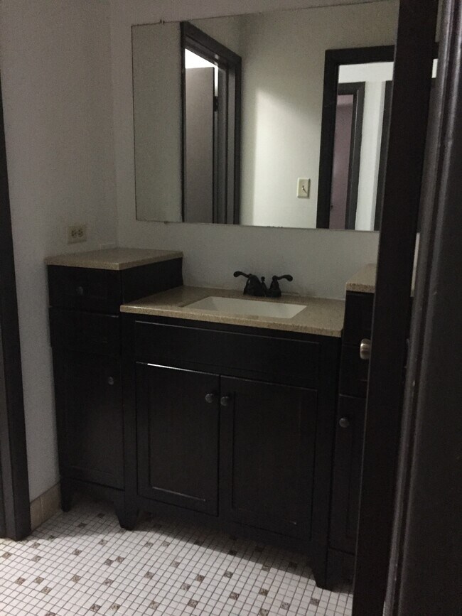 Bathroom with plenty of storage - 8060 W 95th St