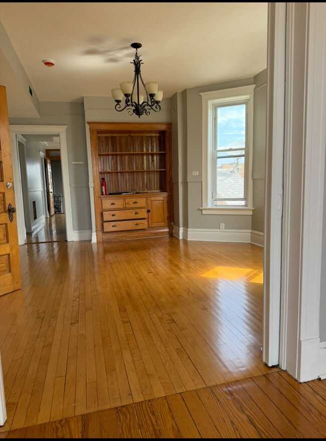 Dinning room/ original hutch - 2138 W 21st Pl