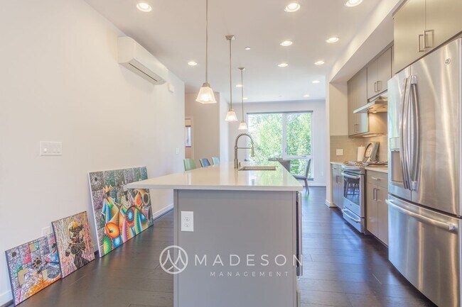 Building Photo - One Month Free Rent! - Spacious Bryant Hei...
