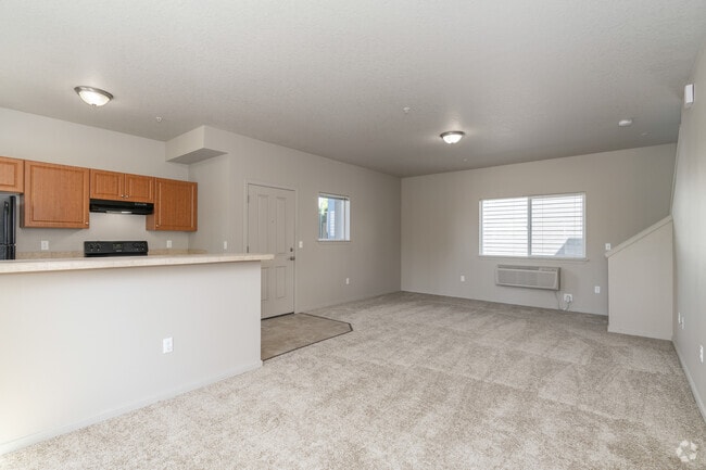 2BR, 2.5BA - 1,079SF Living Room - Sarah Court
