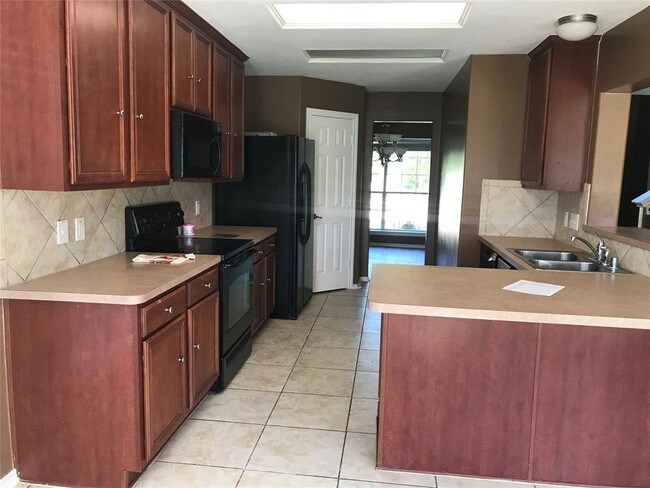 Foto del edificio - 6510 Canyon Mist Ln