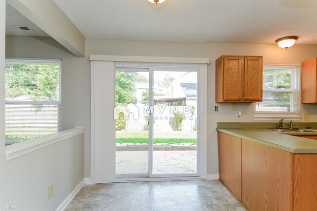 Building Photo - 4 br, 2.5 bath House - 7925 Mcguire Dr