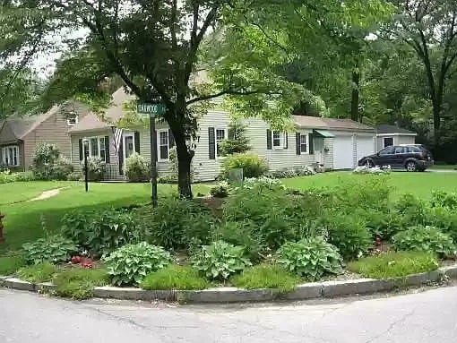 Front and side, roses and other perennials - 58 Oakwood Dr