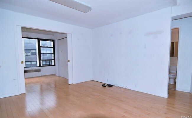 Building Photo - 98-19-98-64 64th Ave