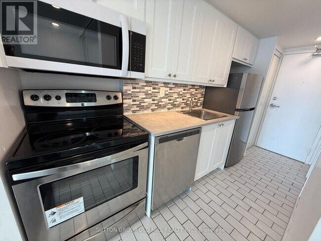 Photo du bâtiment - 705 King St W