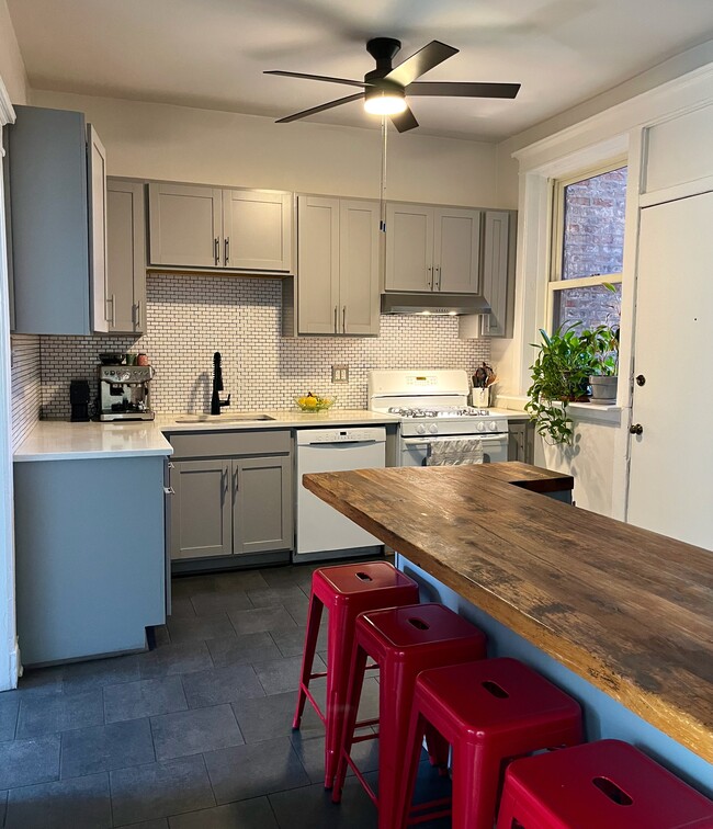 The kitchen is recently renovated and has new appliances, as well as plenty of counter space. - 5142 S Greenwood Ave