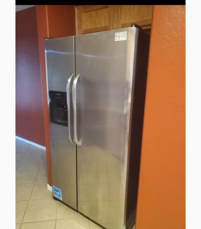 Stainless refrigerator - 7010 S 24th Ln
