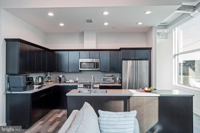 Building Photo - 7809 Woodmont Ave