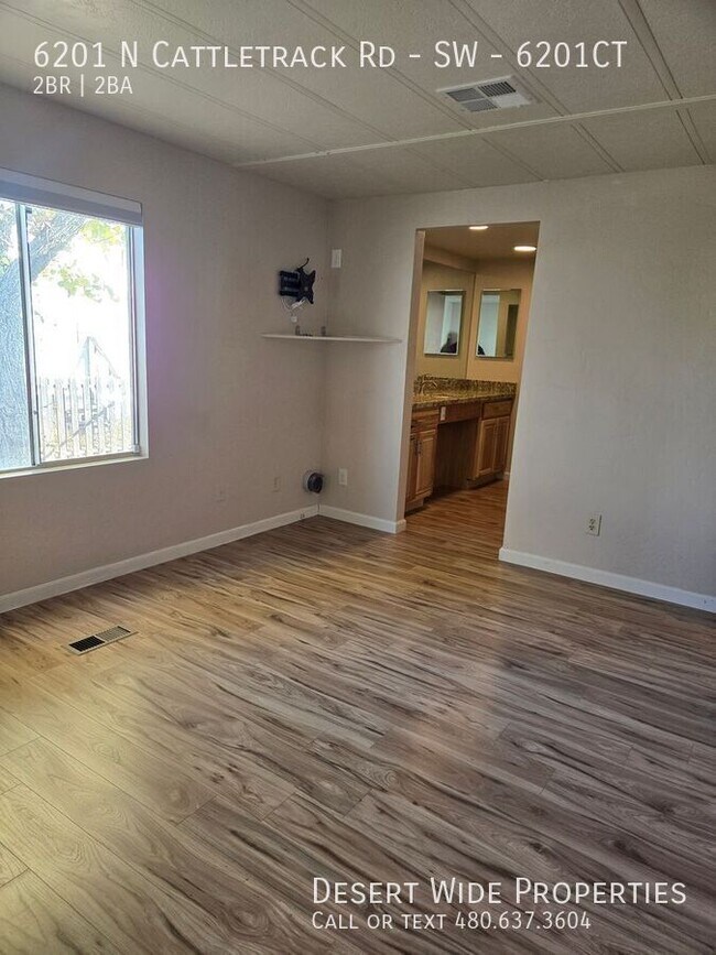 Building Photo - 6201 N Cattletrack Rd