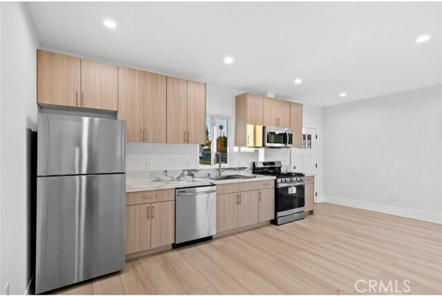 Building Photo - 8635 Le Berthon St