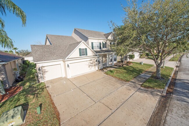Building Photo - Spacious 4/3.5 with Stunning Lake Views in...