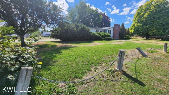 Foto del edificio - 4 br, 1.5 bath House - 14220 E Valleyway Ave