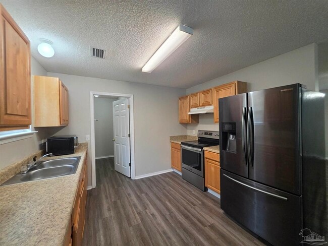 Building Photo - 8660 Figland Ave