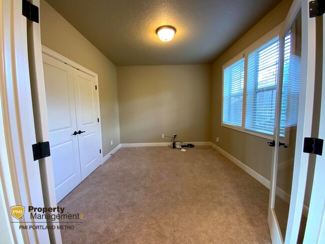 Main Level Bedroom/Den/Office - 14526 SE Lyon Ct