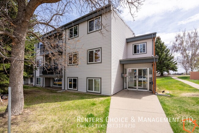 Photo du bâtiment - 1 Bedroom Condo, Assigned Parking, Utilities Included