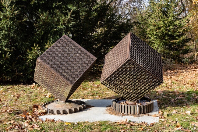 This sculpture sits at a trailhead in Downtown Dover.