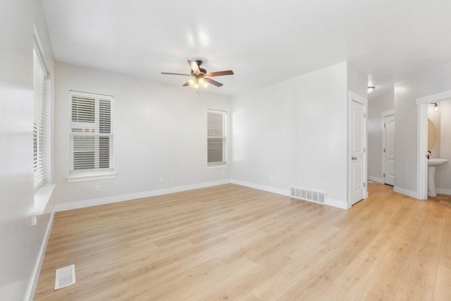Building Photo - Pet Friendly 4-Bedroom End-Unit Townhome
