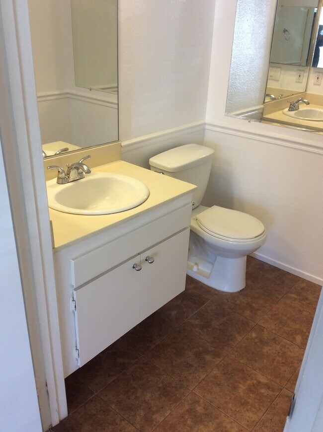 Building Photo - HIGHLY DESIRED, UPGRADED TOWNHOME W/ PATIO...