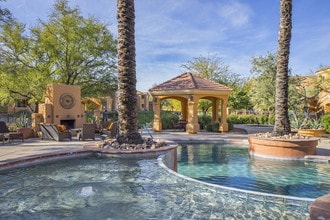 Building Photo - 7050 E Sunrise Dr
