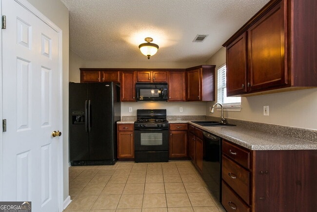 Foto del edificio - 3704 Lower Creek Dr