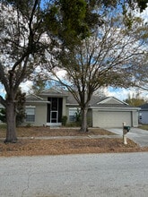 Building Photo - 6817 Regents Village Way