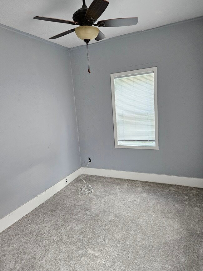 Bedroom #1 with new carpet and Energy Efficient Windows - 2905 Apple St