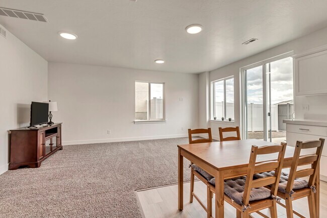 Family room - tons of natural light - 4763 E Silver Ridge Rd