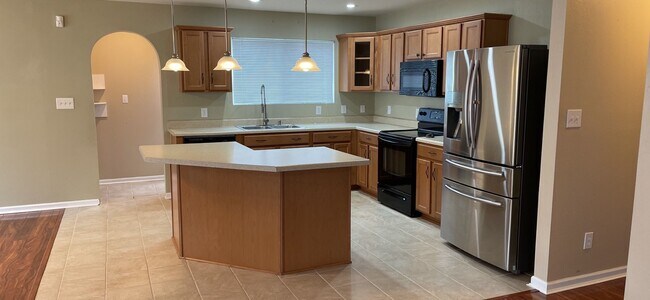 Building Photo - FOUR BEDROOM/TWO BATH BRICK HOME - FENCED YARD